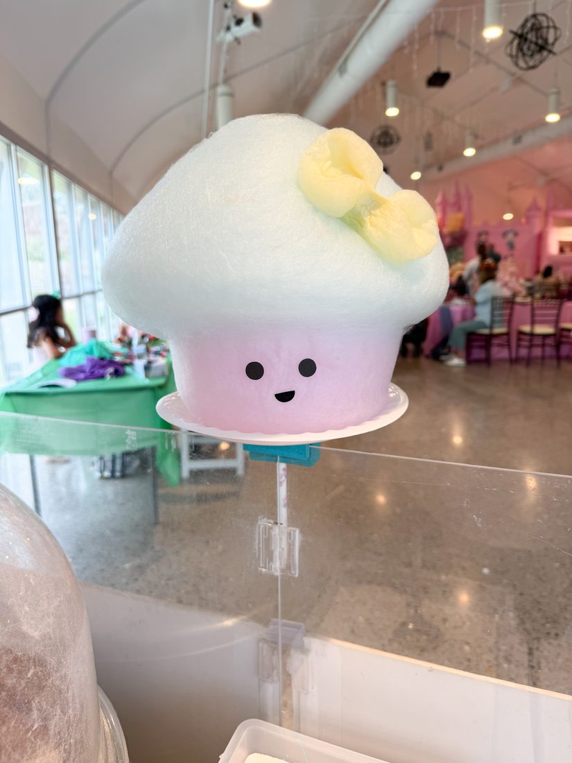 Cotton candy character display booth set up at an El Paso event